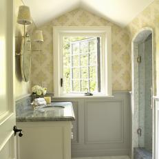 Yellow and Gray Bathroom With Wallpaper