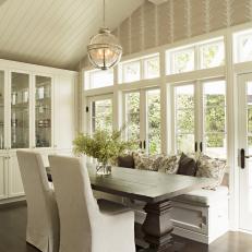 Neutral Cottage Breakfast Room With Vaulted Ceiling