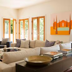 Contemporary Living Room With Orange Art