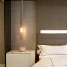 Neutral Modern Bedroom With Light Fixture