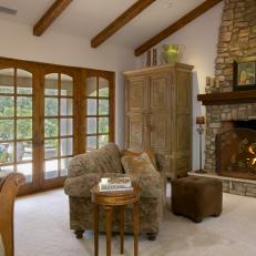 Tuscan-Inspired Living Room With Stone Fireplace