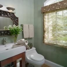 Traditional Powder Room With Floral Roman Shades