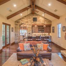 Mediterranean Open Plan Living Room With Exposed Beam Vaulted Ceiling