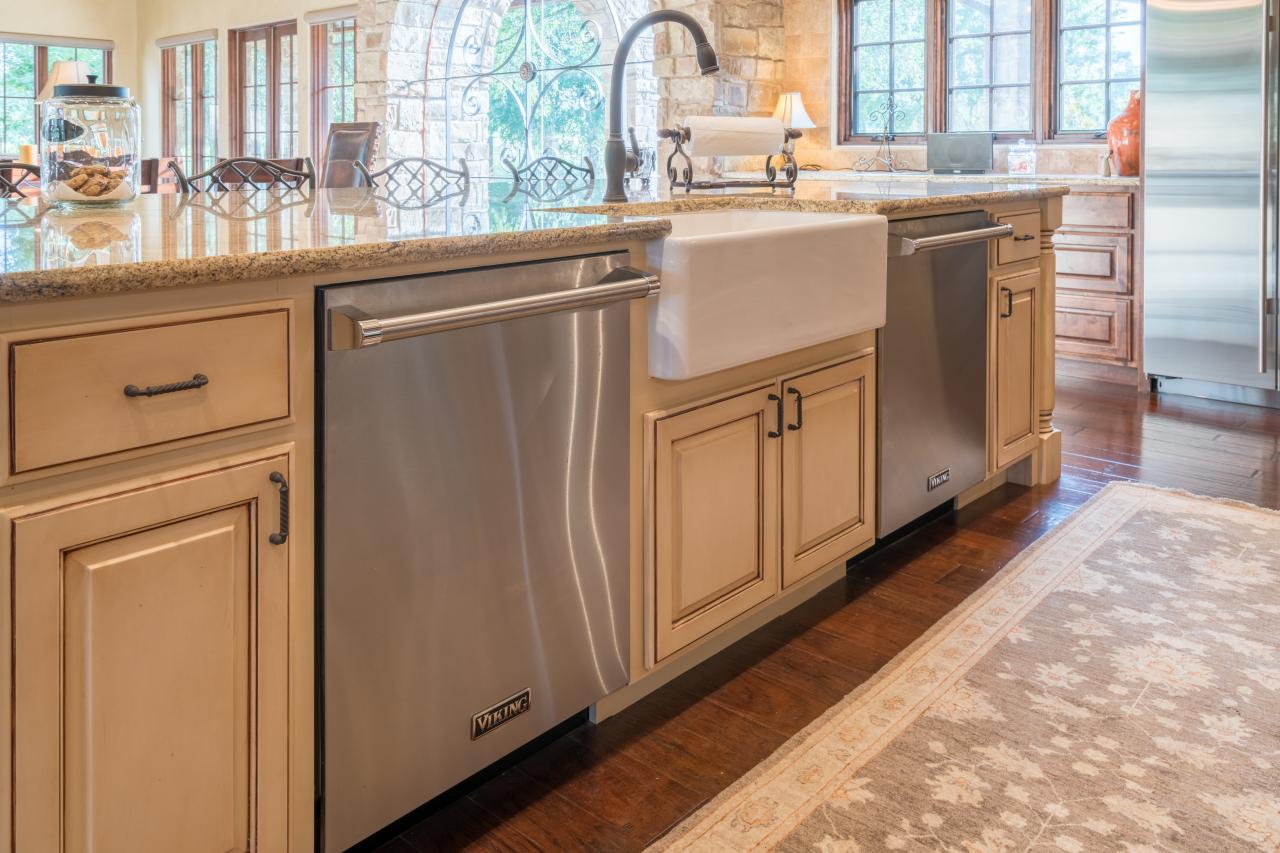 Spacious Mediterranean Kitchen Island With Two Dishwashers | HGTV