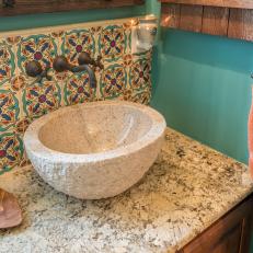 Bold Teal Bathroom With Mediterranean Tile Backsplash and Vessel Sink
