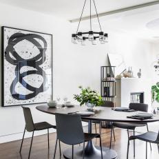 Black and White Contemporary Dining Room With Art