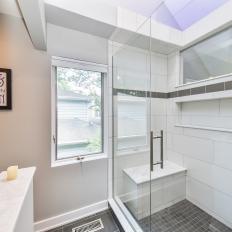 Walk-in Shower With Glass Door and White Subway Tile