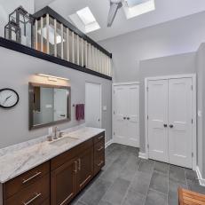Serene Master Bathroom in Gray With Purple Accents