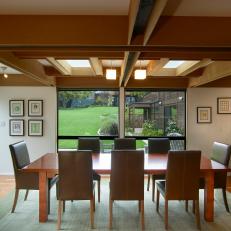 Wood Coffered Ceiling, Leather Dining Chairs And Built In China Cabinet in Midcentury Modern Dining Room 