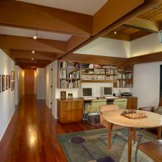 Midcentury Modern Study and Open Connection Hall With Wood Coffered Ceiling, Built In Bookshelf and Natural Wood Table