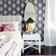 Eclectic Bedroom With Gray and White Wallpaper and Pink Area Rug