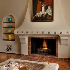 Mantel in Spanish Colonial Living Room Adds Dramatic Effect