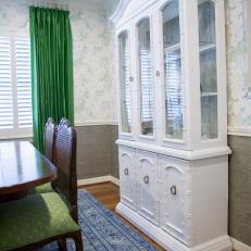 White China Cabinet and Green Curtain