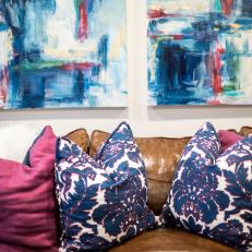 Leather Sofa With Blue and Pink Pillows