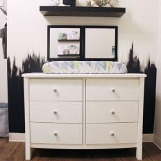 Repurposed Dresser Provides Changing Table in Black and White Nursery
