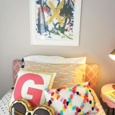 Girls' Bedroom With Gold Sunglasses Throw Pillow and Framed Kids' Artwork