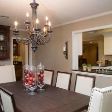 Formal Dining Room with New Chandelier and Modern Table and Chairs