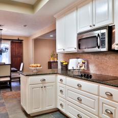 Stone Backsplash Adds Color and Contrast to Kitchen
