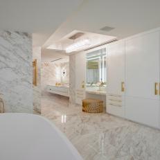 White Spa Bathroom With Gold Accents