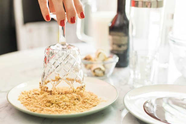 Step 1- Rim the GlassPour the chocolate syrup into a rimmed saucer and place the crumbled graham crackers in another. Rim each glass in chocolate first, then the crumbled graham cracker.