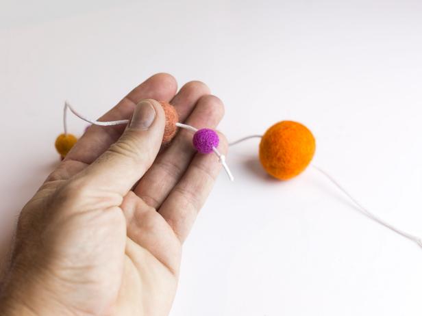 Create a colorful felt ball mobile