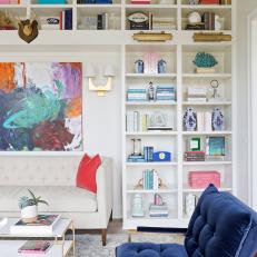 Multicolored Eclectic Library With Blue Chair