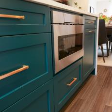 Turquoise Kitchen Cabinets Around Built in Small Oven 