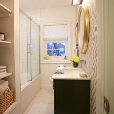Narrow Bathroom With Built In Open Shelving and Sliding Glass Door Shower 