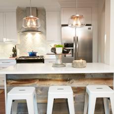 Cool, Contemporary Kitchen Bar With Natural Wood Details, White Metal Barstools and Pendant Lighting 
