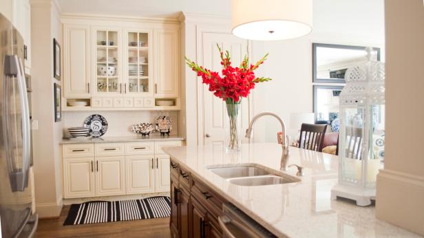 Traditional Kitchen With Cream Cabinets Island Drum Fixture And