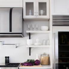 Modern Black and White Kitchen with Open Shelves

