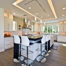White Contemporary Open Plan Kitchen With Wood Floors