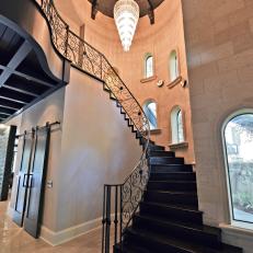 Statement-Making Staircase in Traditional Entryway