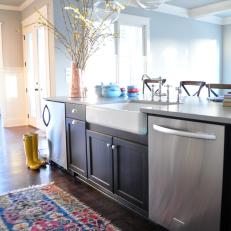 Transitional Kitchen with Glass Pendants, Dark Cabinets and Colorful Rug