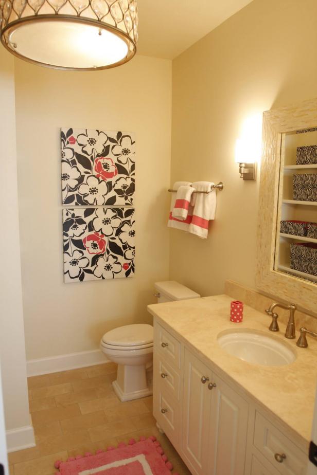 Pink Small Bathroom with Floral Artwork | HGTV