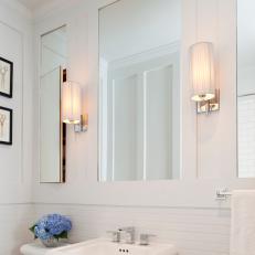 White Modern Bathroom with Horizontal Beadboard and Mirrors