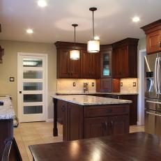 Transitional Eat-In Kitchen With Dark Brown Wood Cabinets
