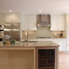 Transitional Kitchen With White Cabinets and Neutral Granite Countertops 