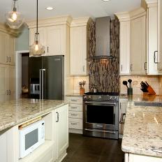 Transitional Kitchen With Ivory Cabinets and Neutral Cambria Countertops 