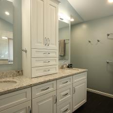 Spacious Master Bathroom With Double Sink Vanity and Built-In Countertop Cabinet