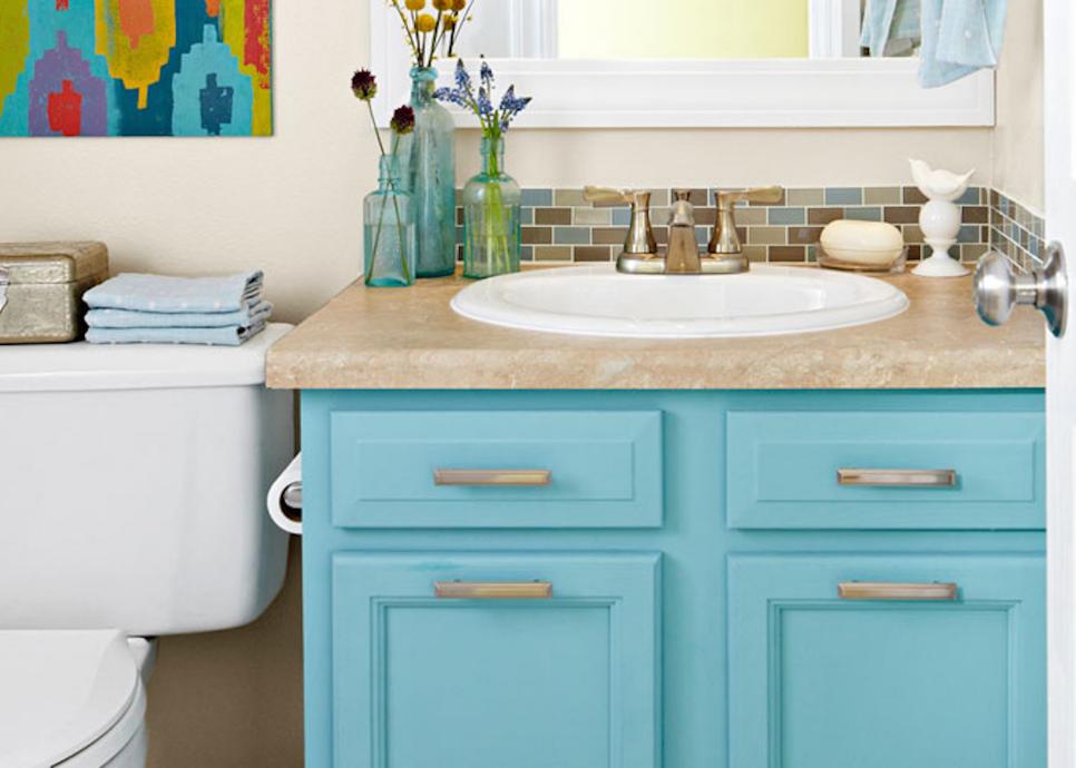 Colorful Small Bathroom with Blue Vanity and Band of Tile | HGTV
