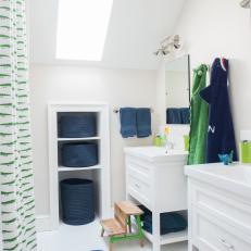 Navy and Green Details in Kids' Bathroom