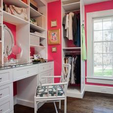 Pink and White Walk-In Closet With Window
