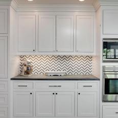 White Kitchen Cabinets and Striped Backsplash