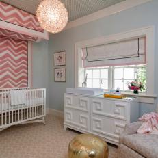 Blue and Pink Contemporary Nursery With Pouf