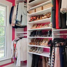 Pink and White Walk-In Closet With Shoes