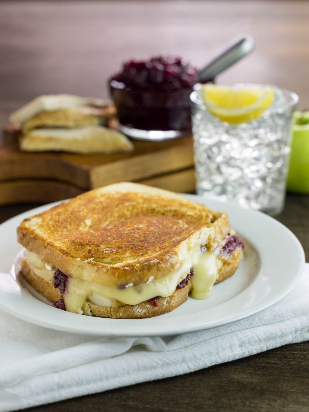 Cranberry Sauce Over Turkey and Brie Sandwich