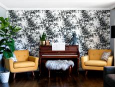 Eclectic Living Room With Piano and Black and White Floral Wallpaper