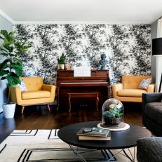 Eclectic Living Room With Midcentury Modern Armchairs and Floral Wallpaper