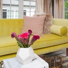 Yellow Sofa, Glass Coffee Table and Pink Flowers